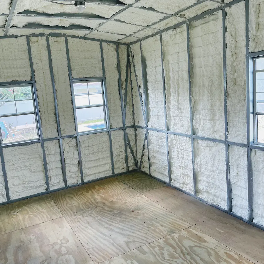 Closed-cell spray foam insulation applied to wall cavities in a residential project in Sunbury